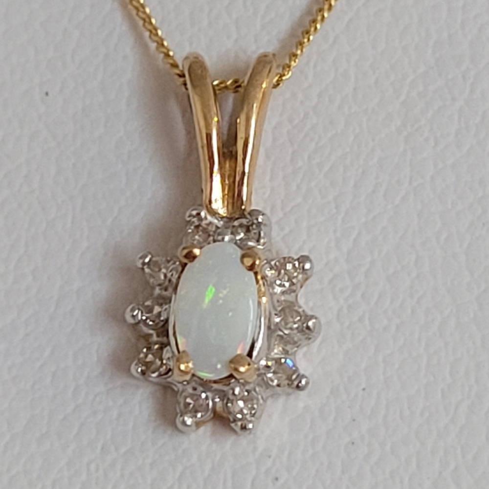 10k Solid Gold Pendant With Genuine Opal Center & Diamonds, 18" Chain Included.